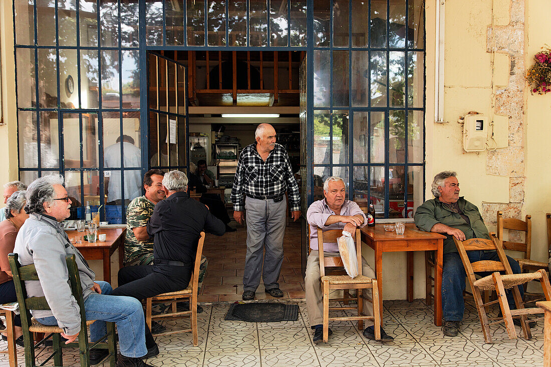 Men in a coffeehouse, Kafenio, Neo Chorio, Chania Prefecture, Crete, Greece
