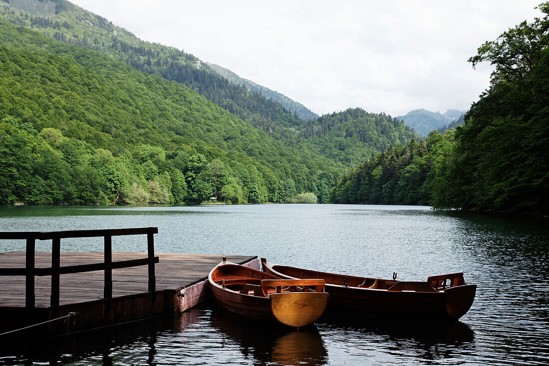 Boats at a jetty at lake Biograd, Biogradska Gora National Park, Montenegro, Europe