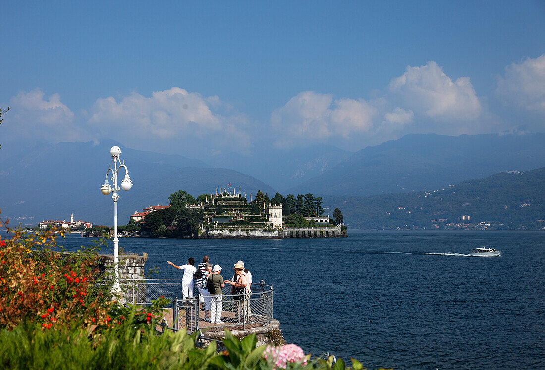Tourists, view over Borromean Palazzo, Isola Bella, Stresa, Lago Maggiore, Piedmont, Italy