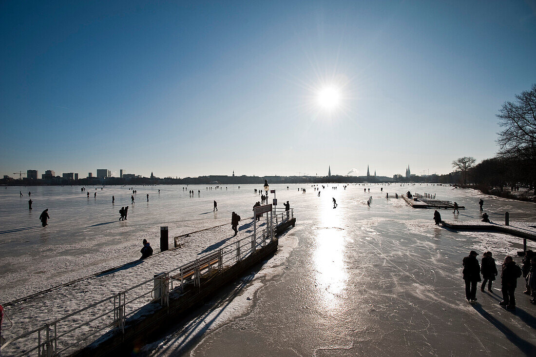 People on frozen Aussenalster, winter impressions, Hamburg, Germany, Europe