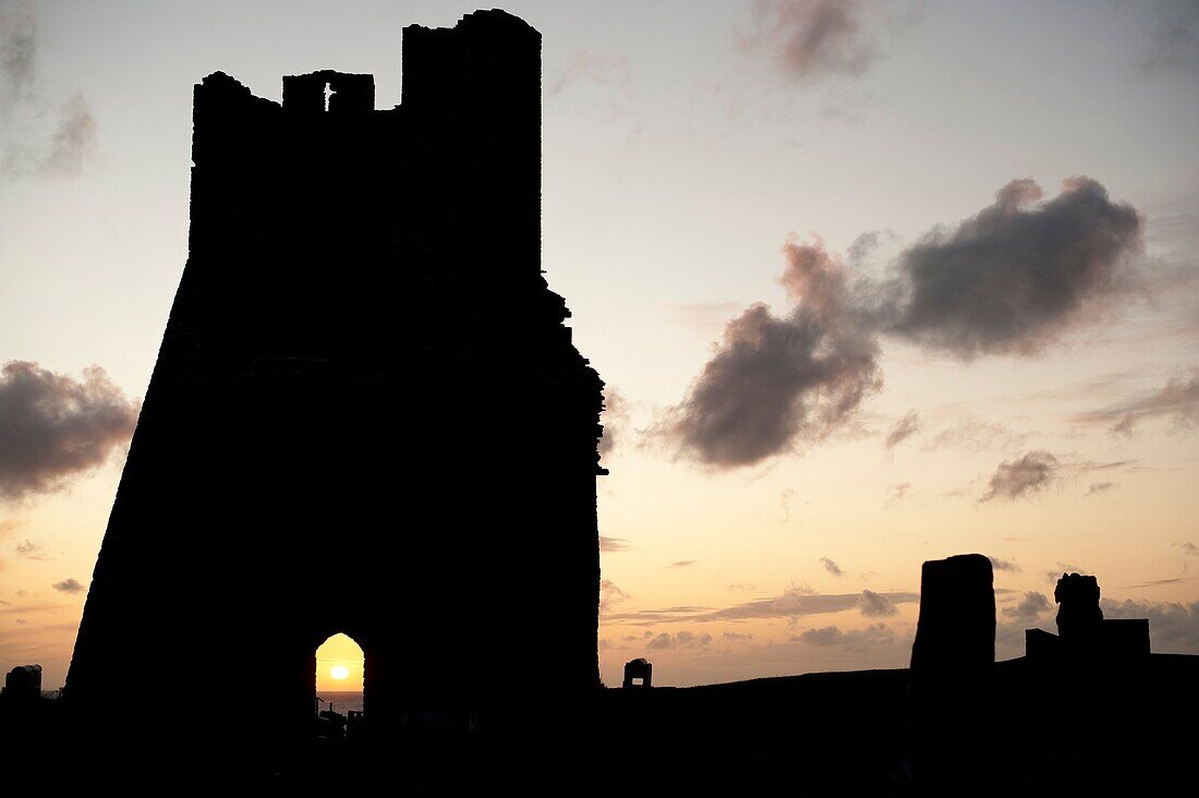 Aberystwyth castle tower ruins at sunset, Wales UK