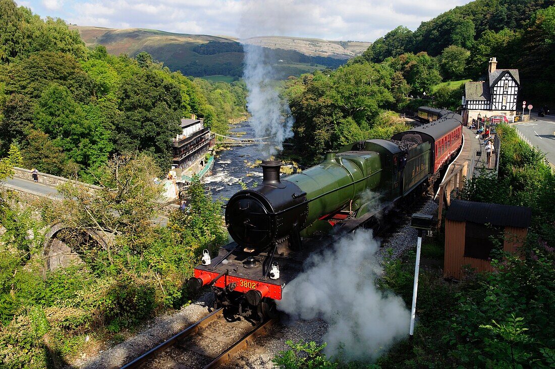 GWR Steam train on the restored Llangollen railway heritage tourist line at Berwyn station in the Dee valley, Flintshire north wales UK