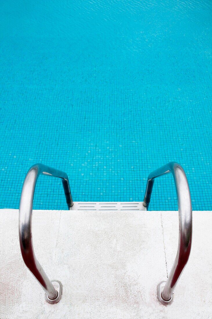 Ladder in swimming pool