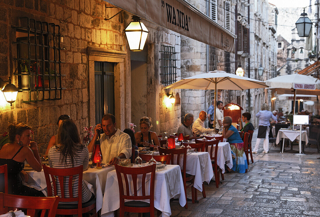 Pavement restaurants in old town in the evening, Dubrovnik, Dubrovnik-Neretva county, Dolmatia, Croatia