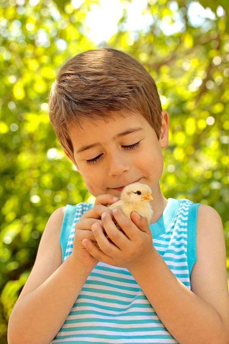 Boy with chick