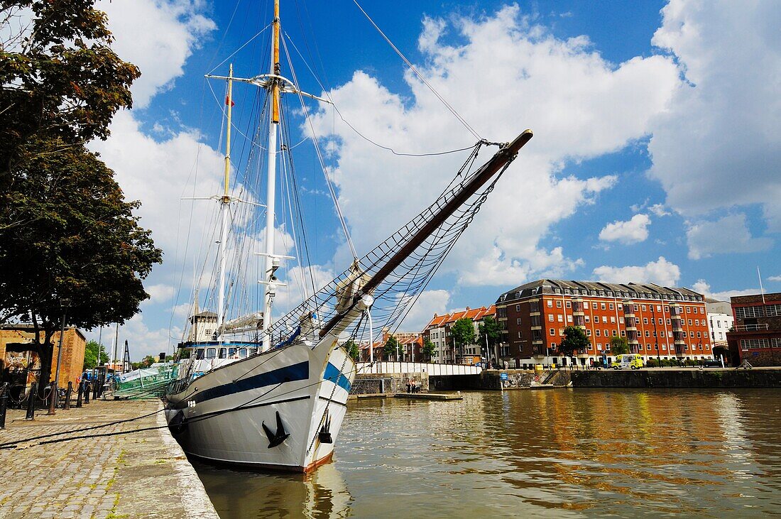 A sailing ship mored up along the quay on the floating harbour at Princes Wharf in Bristol, England