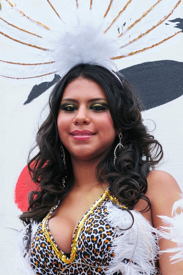 Dancer on one of the floats at the Carnaval del Pueblo Latin American Festival, London, England, UK