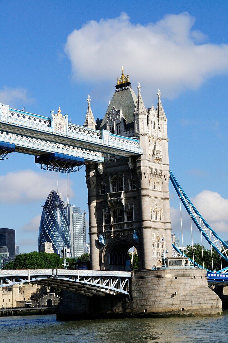 Detail of Tower Bridge with The Gherkin Building, London, England, UK