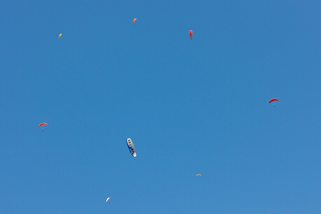 Paragliders fly above the Oludeniz village Province of Mugla, Turkey