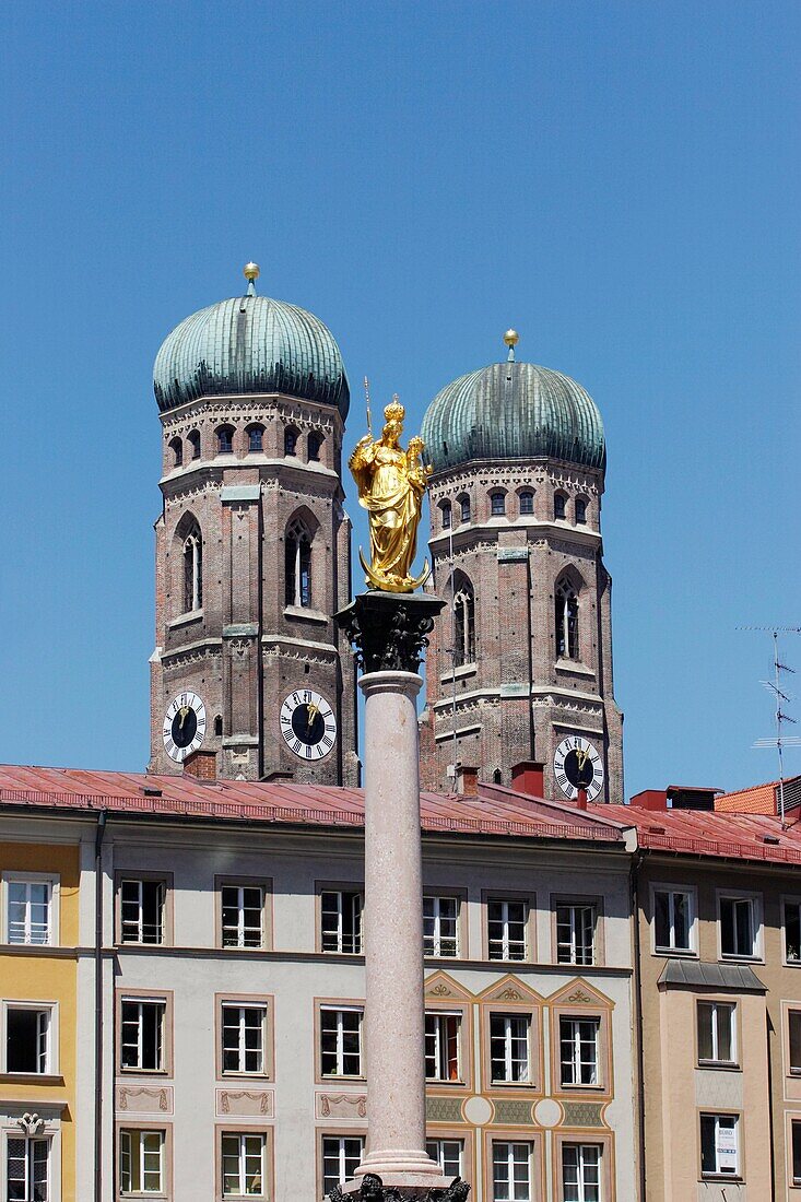 Towers of Frauenkirche and Mary's column in the middle Munich, Bavaria, Germany
