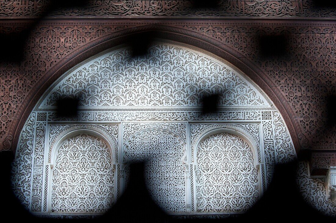 Madrasah El Marini, inner courtyard seen through the wooden grid, Meknes, Morocco