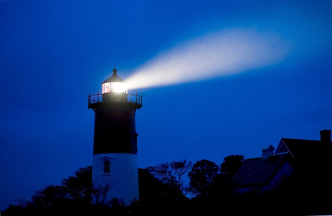 Nauset Light shines during a stormy night, Cape Cod National Seashore, Eastham, Cape Cod, MA, USA