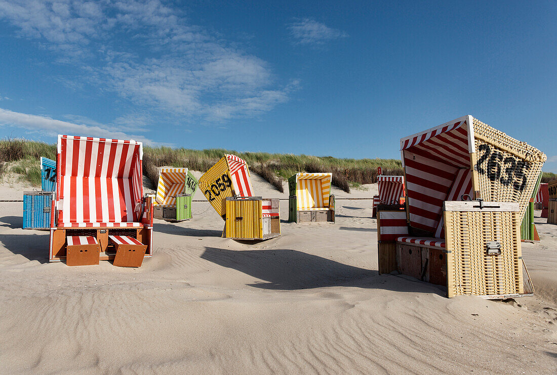 Colourful beach chairs on the beach, North Sea Spa Resport Langeoog, East Frisia, Lower Saxony, Germany
