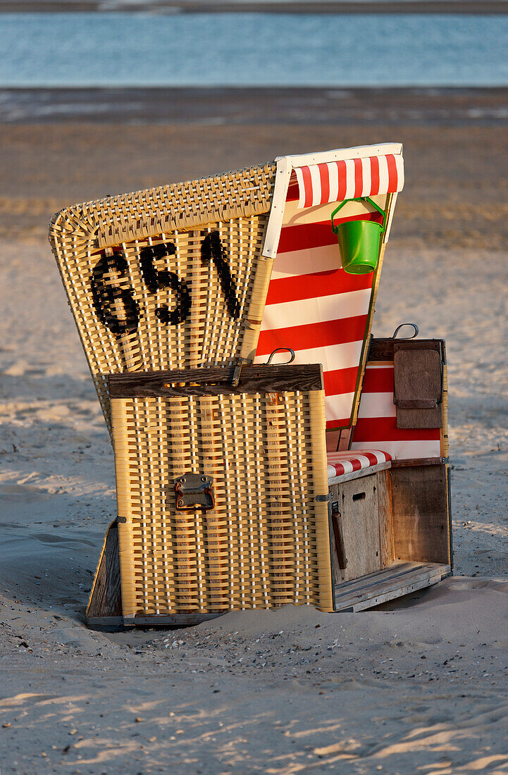 Canopied Beach Chair on the beach, North Sea Spa Resort Langeoog, East Frisia, Lower Saxony, Germany