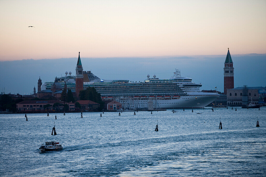 Cruiseship Azura, P and O Cruises, on Canale di San Marco and Campanile tower at dusk, Venice, Veneto, Italy, Europe