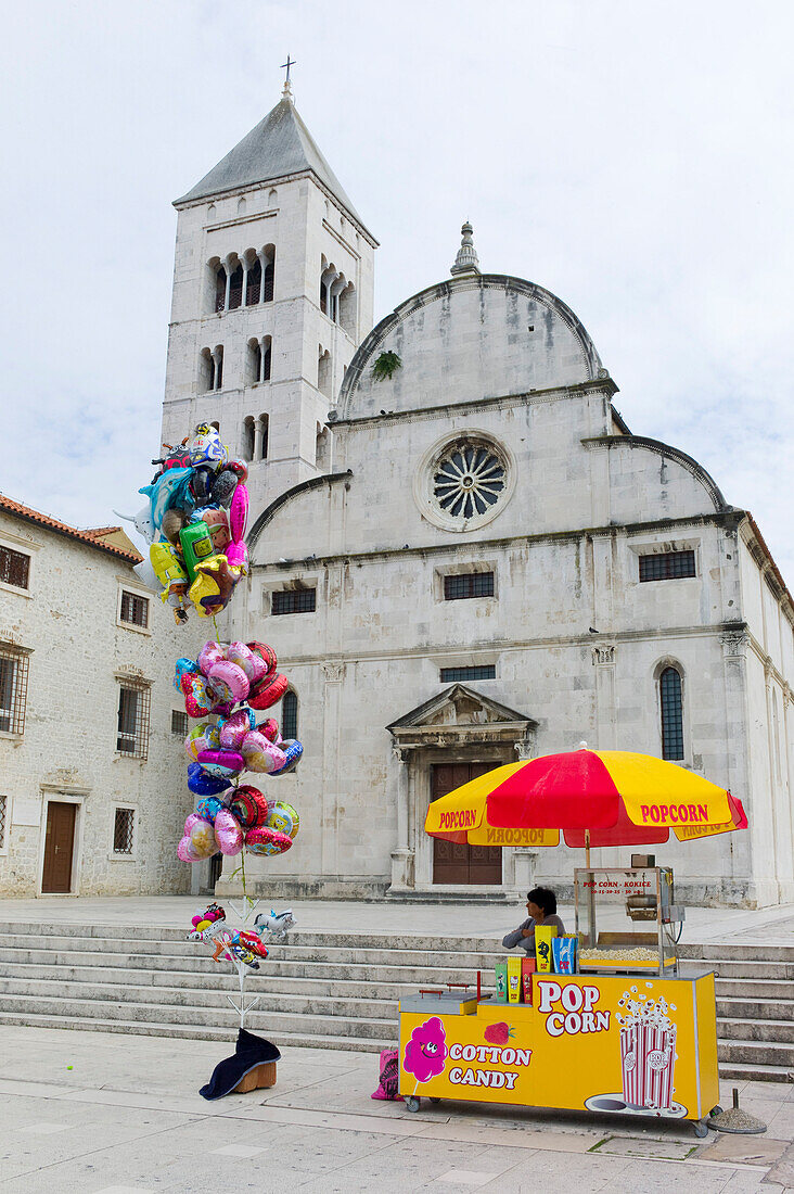 Popcorn, candy and balloon stand in front of the church of Sv. Marija, Zadar, Croatia, Europe