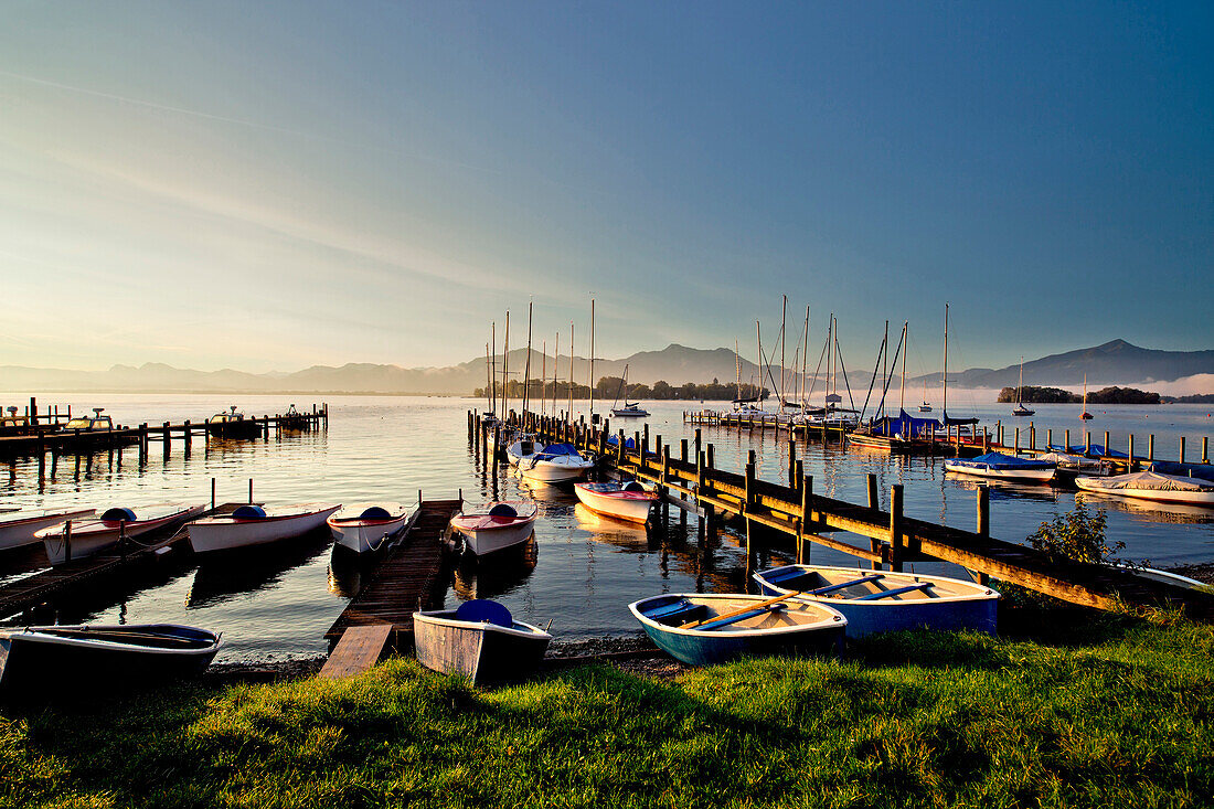 Morning mood in Gstadt with a view on Fraueninsel, Chiemsee, Chiemgau, Upper Bavaria, Bavaria, Germany