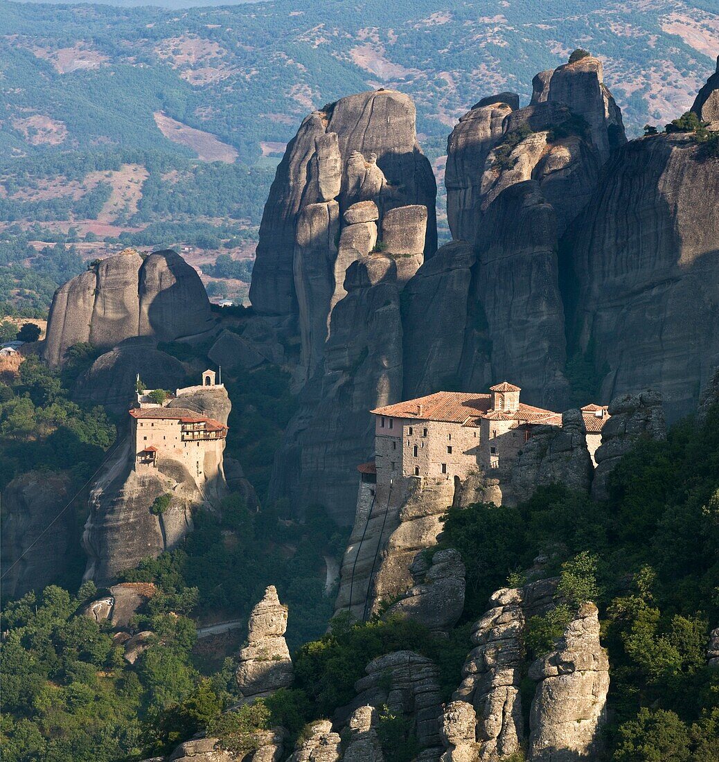 Looking down on the monasteries of Roussanou right and St Nicholas Anapafsas Left Meteora, Kalambaka, Thessaly, central Greece
