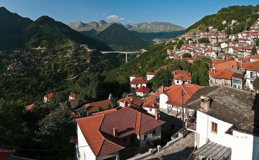 The village of Metsovo looking south toward the village of Anilio and the new Via Egnatia expressway, with the Pindos mountains in the background, Epirus, northern Greece