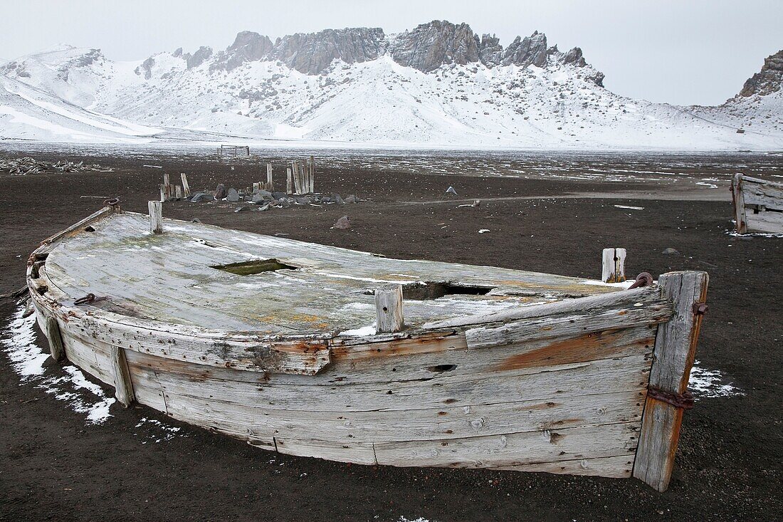 Abandoned water boat at Whalers Bay inside of the caldera at Deception Island, South Shetland Islands, Antarctica, Southern Ocean MORE INFO A recently active volcano, its eruptions in 1967 and 1969 caused serious damage to the scientific stations there