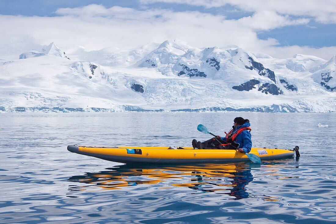 Guests from the Lindblad Expedition ship National Geographic Explorer kayaking in and around the Antarctic Peninsula in the summer months