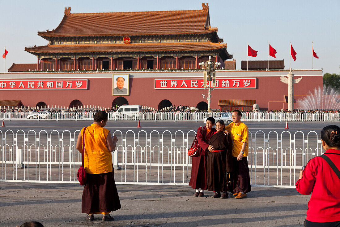 Tibetan monks and nuns on Tiananmen Square, taking pictures, Gate of Heavenly Peace, Mao Zedong, Beijing, People's Republic of China