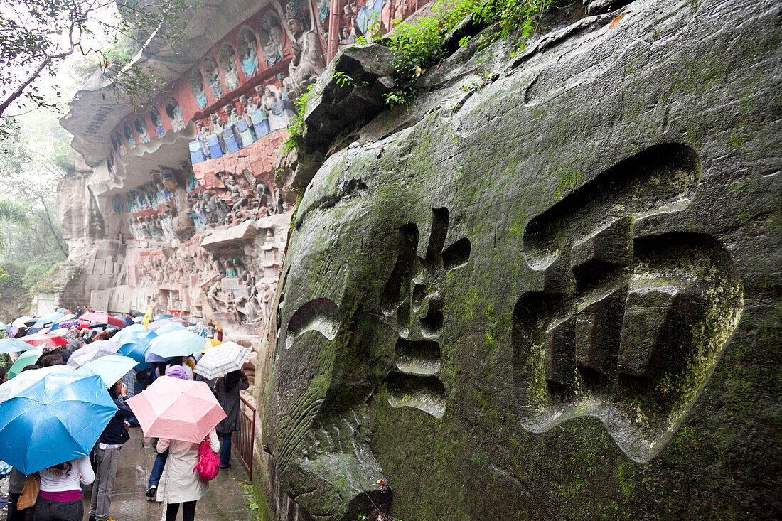 Buddhist caves of Dazu, World Heritage Site, a buddhist monk started to do carvings in the rock in the 11th century, Mahayana buddhism, tourists, Dazu, Chongqing, People's Republic of China