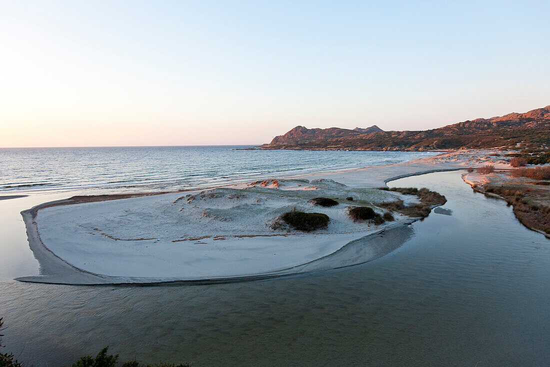 Bay at the mouth of the Ostriconi River at sunset, East coast of Corsica, Desert des Agriates, Corsica, France