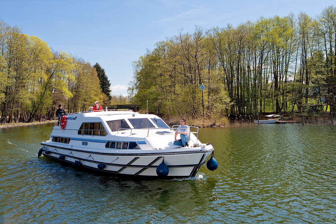 Houseboat on lake Zechliner near Zechlinerhütte, North Brandenburg Lake District, Brandenburg, Germany