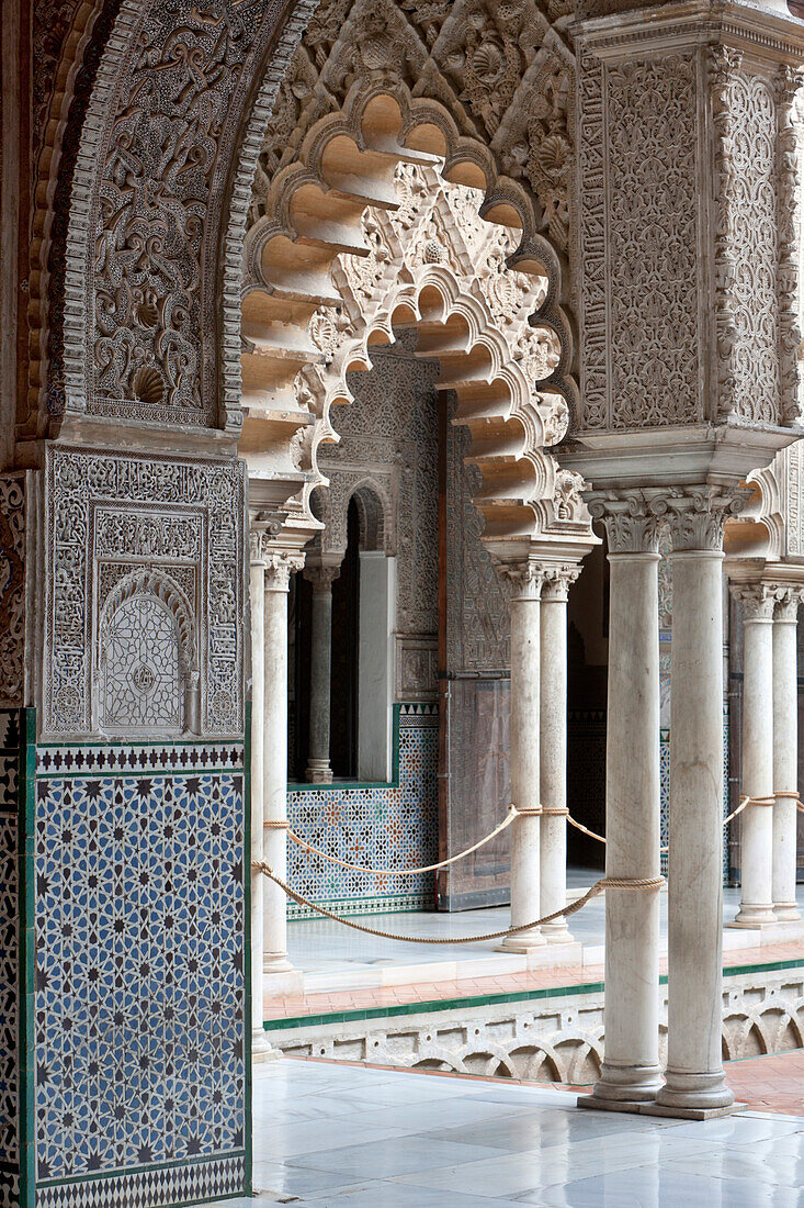 Detail of the Patio de las Doncellas, Alcázar of Seville, royal palace originally a Moorish fort, Seville, Spain