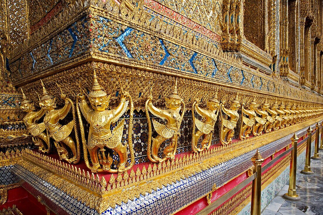 Gold ornamental patter statuettes Temple of the Emerald Buddha The Grand Palace Bangkok Thailand