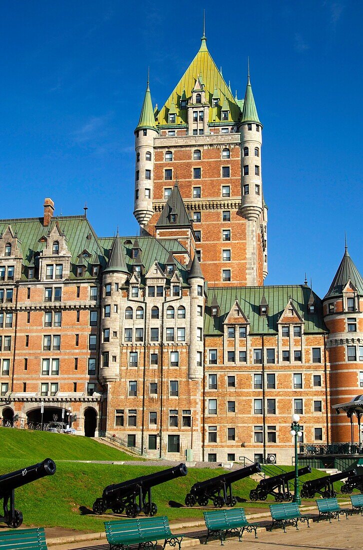 Old guns on the promenade in front of the Hotel Fairmont Le Château Frontenac Quebec City, Canada