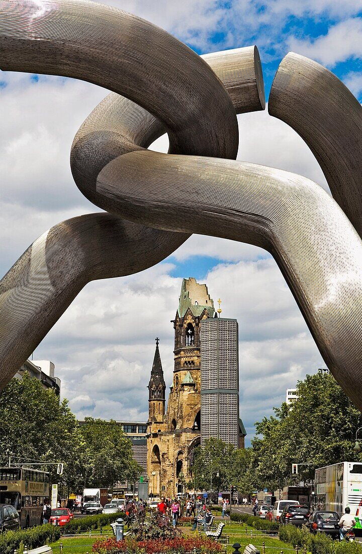 The Kaiser Wilhelm Gedächtniskirche framed by the Berlin sculpture by Eduardo Chillida Tauentzienstrabe Berlin Germany