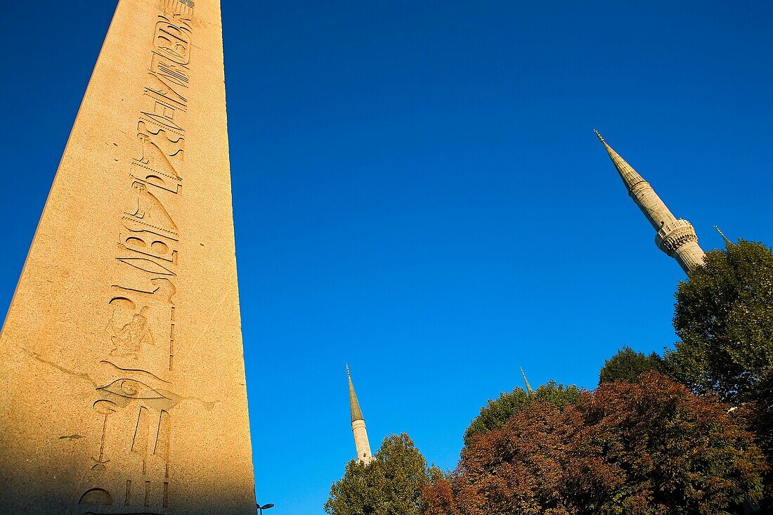 Obelisk of Theodosius in the Hippodrome of Constantinople and minarets of Blue Mosque Sultan Ahmet mosque, Istanbul, Turkey