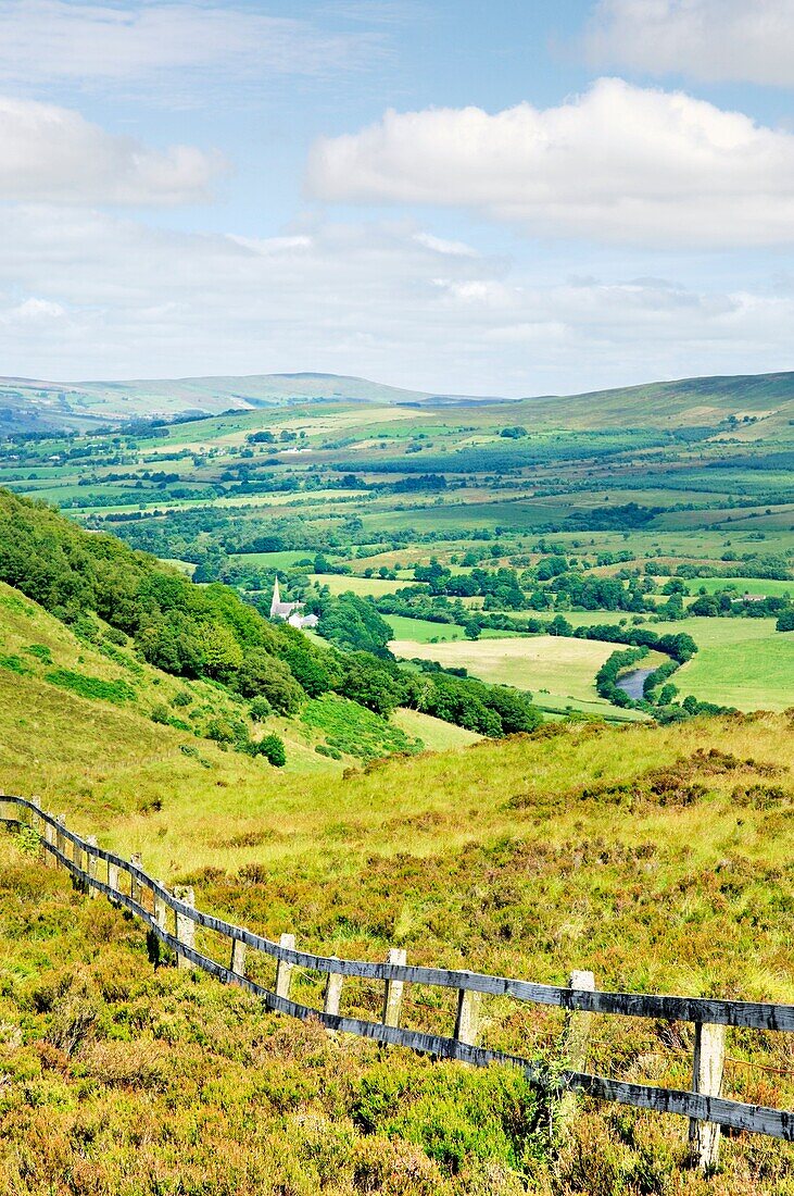Sperrin Mountains, County Tyrone, Ireland North over Gortin village in valley of the Owenkillew River east of Newtownstewart