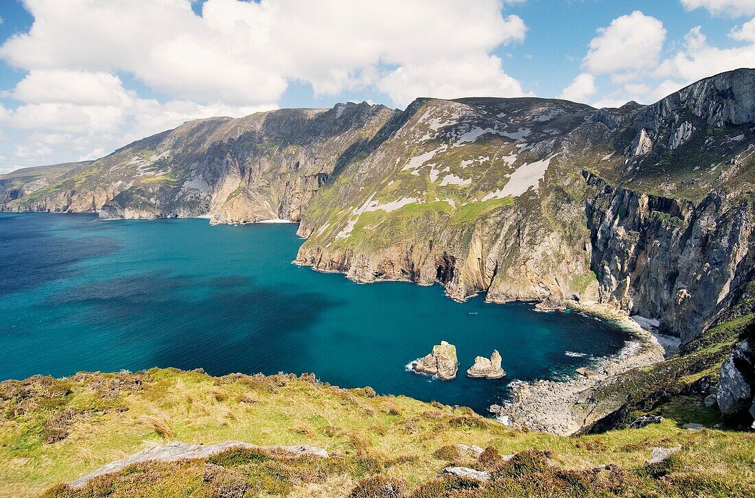 Slieve League cliffs, Ireland's highest, seen from Carrigan Head, rise from the Atlantic west of Killybegs in S W Donegal