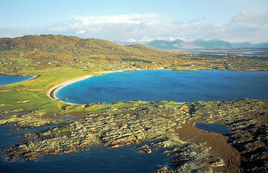 Beach at Gorteen Bay SW of Roundstone in Connemara region of Co Galway, Ireland Aerial north toward the Twelve Pins mountains