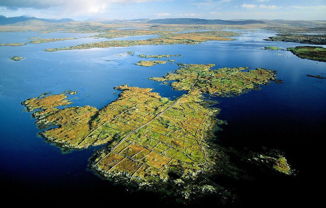 Kilkieran Bay, Connemara, County Galway, Ireland Northeast over the dry stone wall field patterns on the island of Inishtravin