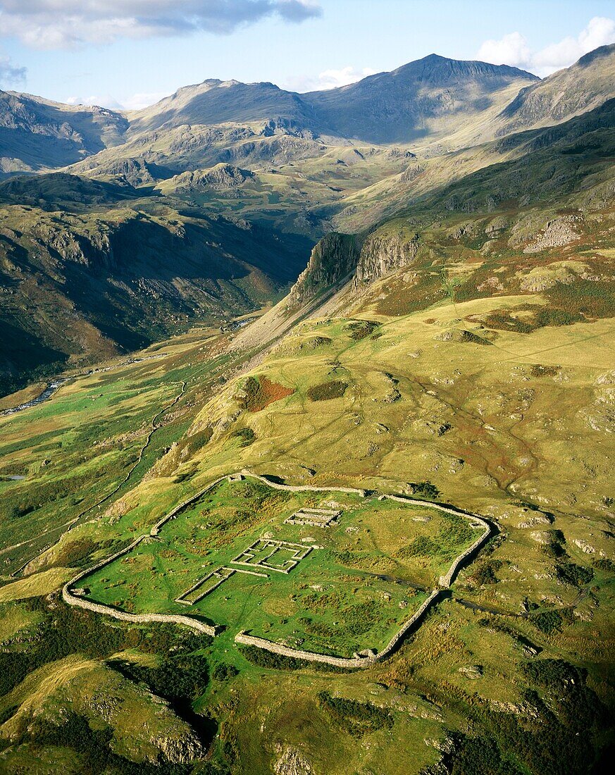 Hardknott Roman Fort Mediobogdum with Bowfell mountain behind above Eskdale in Lake District National Park Cumbria England UK