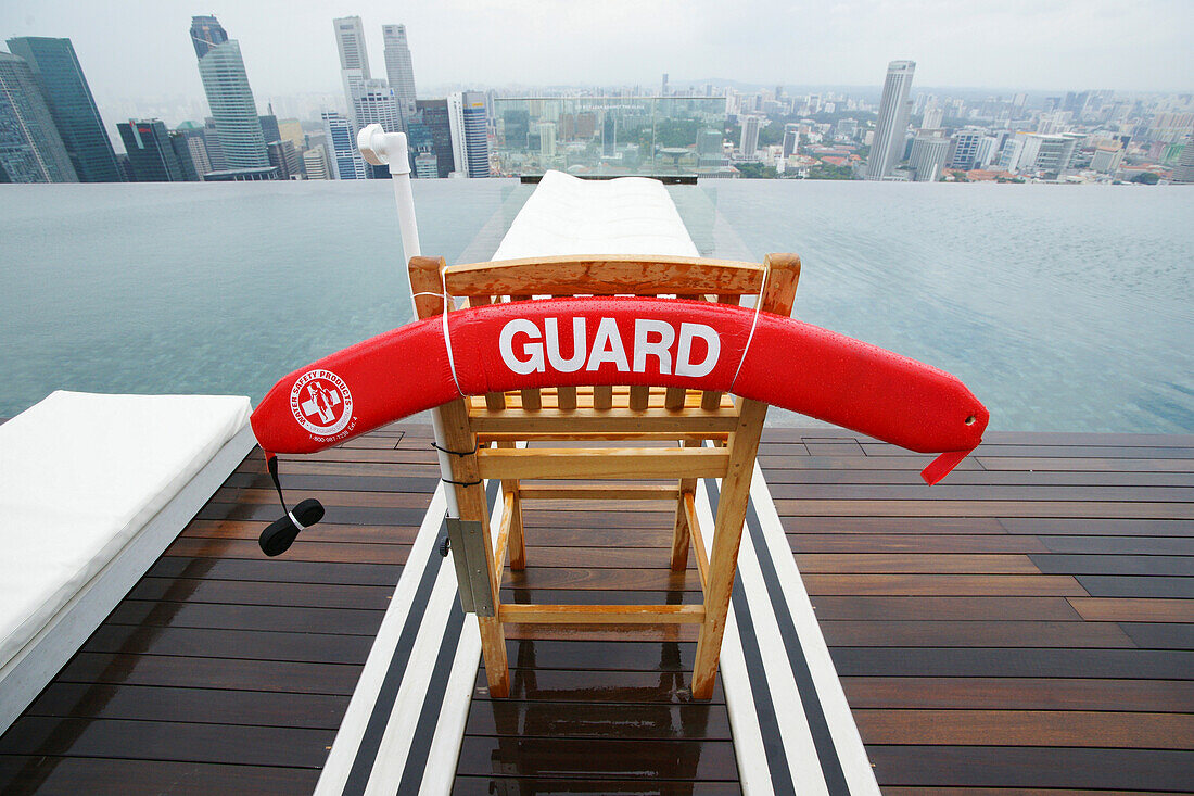 Lifeguard at Sands SkyPark infinity pool, Marina Bay Sands Hotel, Singapore, Asia