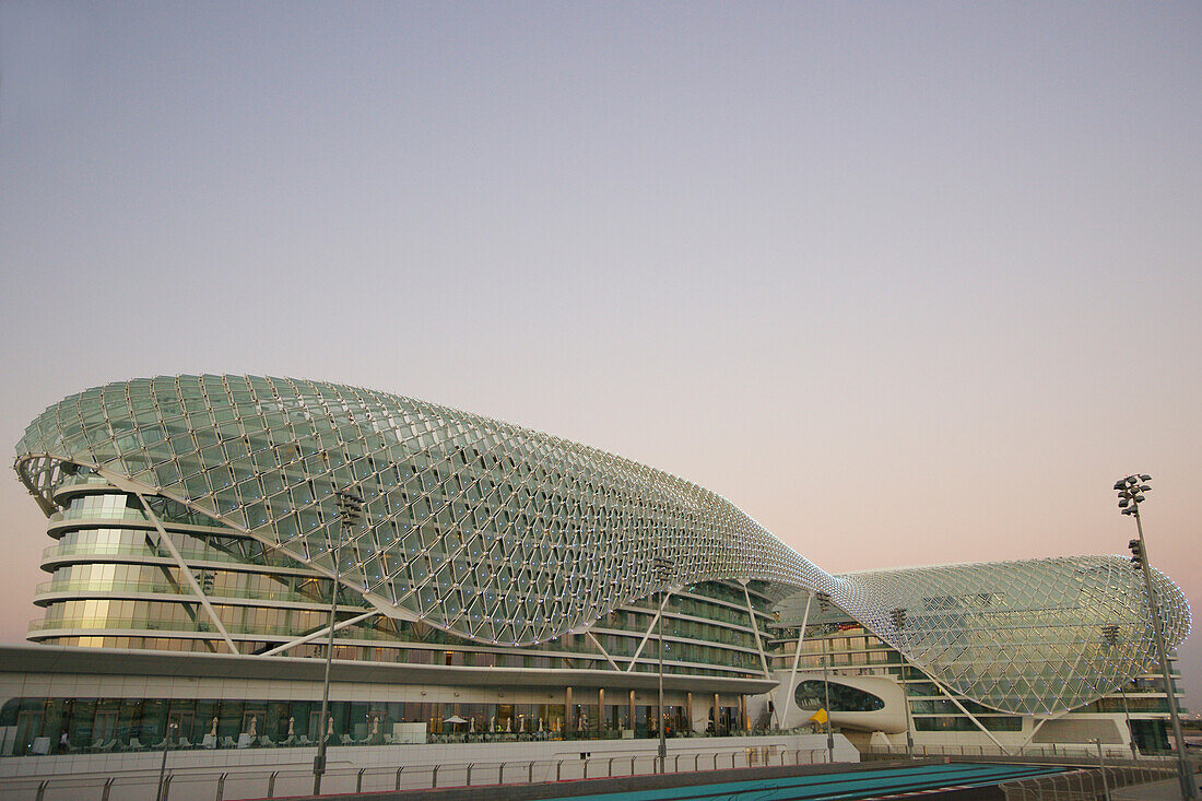 The Yas Hotel, a hotel facility built across the F1 Yas Marina Circuit, Yas Island, Abu Dhabi, United Arab Emirates, UAE