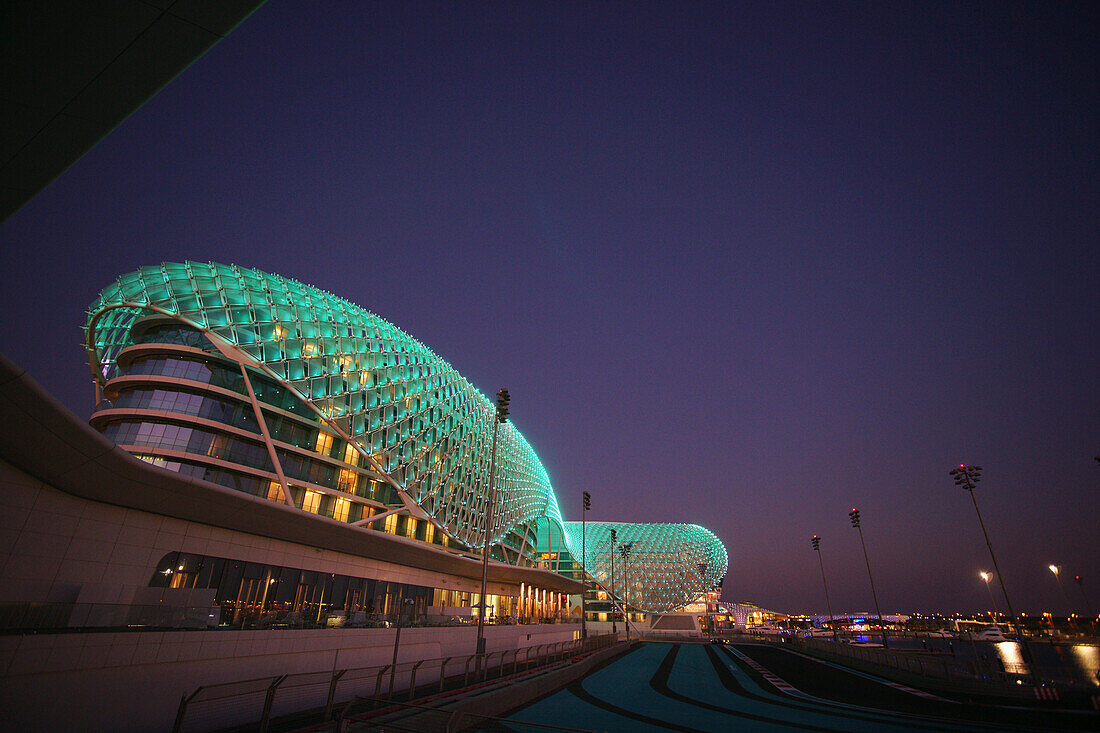 The Yas Hotel, a hotel facility built across the F1 Yas Marina Circuit, Yas Island, Abu Dhabi, United Arab Emirates, UAE