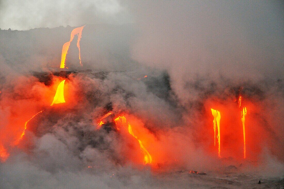 Steam rising off lava flowing into ocean, Kilauea Volcano, Hawaii Islands, United States