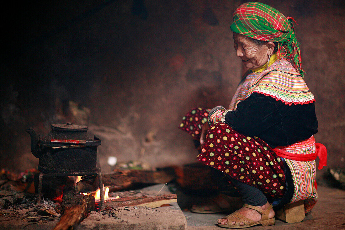 Flower Hmong woman at home, Bac Ha - near, Vietnam