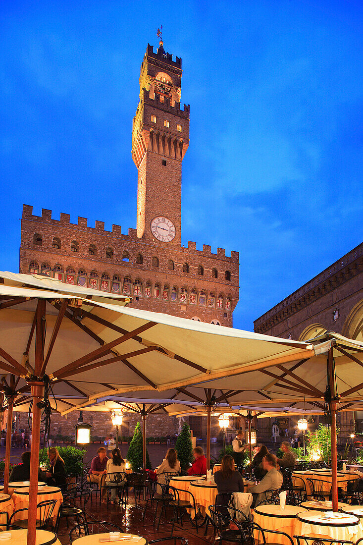 Piazza della Signoria - Palazzo Vecchio and restaurant at night, Florence, Tuscany, Italy