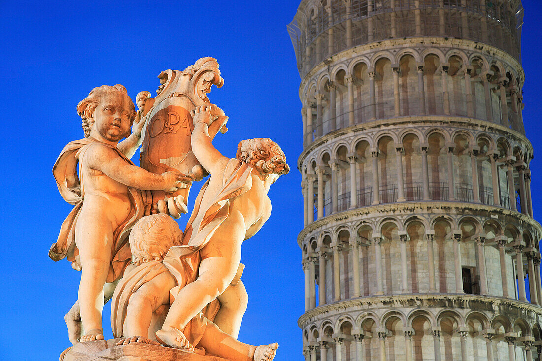 Statue and Leaning Tower - Torre Pendente at night, Pisa, Tuscany, Italy