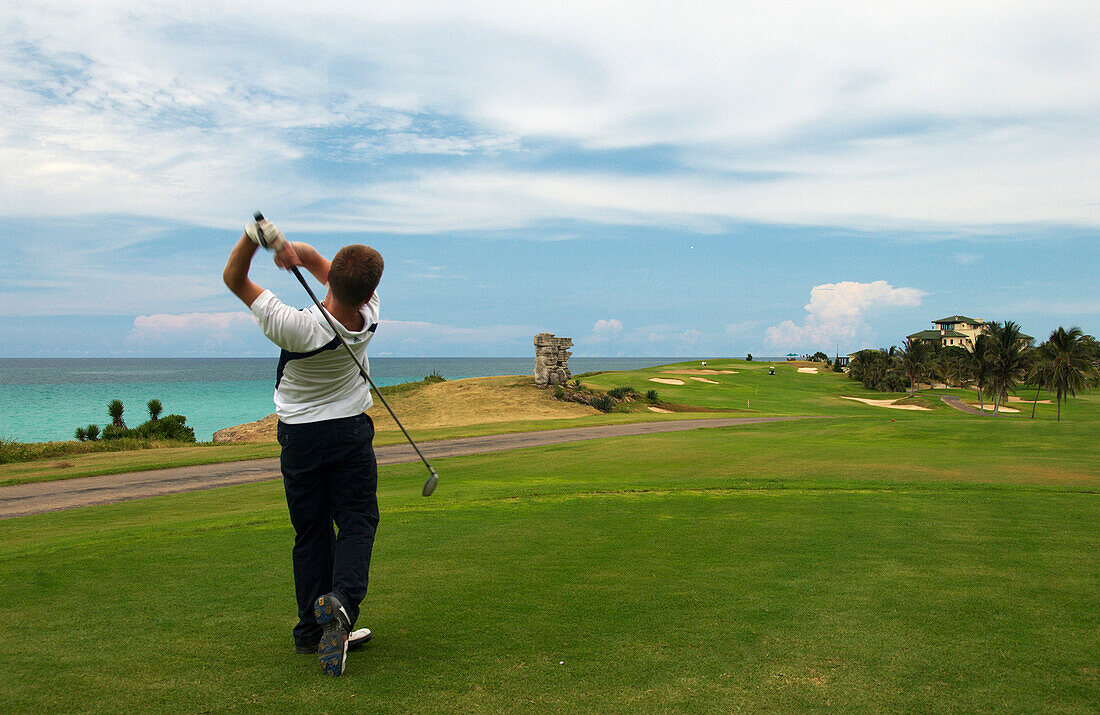Golfer and ocean view at the Varadero Golf Club, Varadero, Cuba, Caribbean