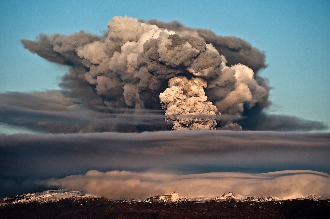 The ash plume of Eyjafjallajökull at sunset shortly after the start of the eruption