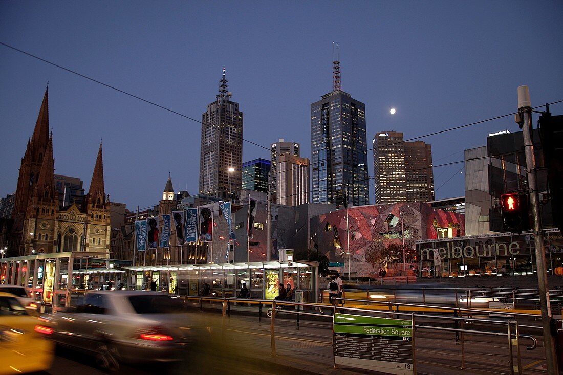 traffic at Federation Square and the Melbourne Skyline at night, Victoria, Australia