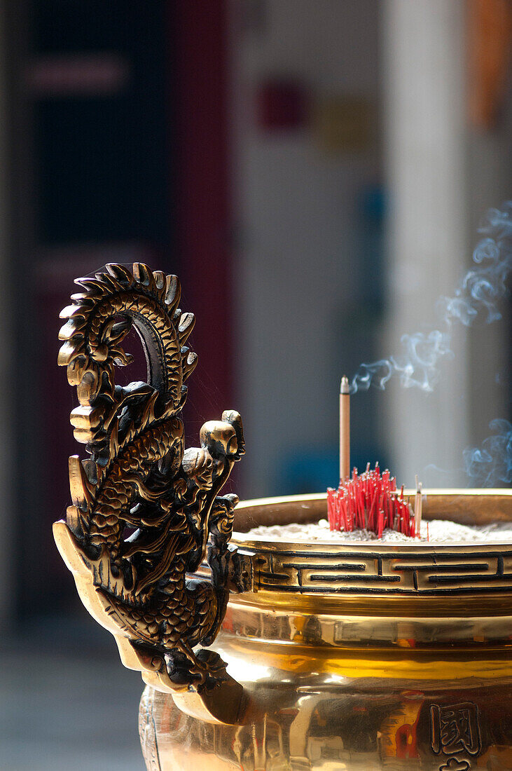 Burning incense sticks in a Chinese Temple, Petaling Street, Kuala Lumpur, Malaysia, Asia